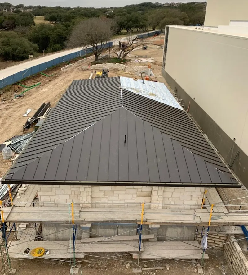 Metal roof new construction with scaffolding in Easley