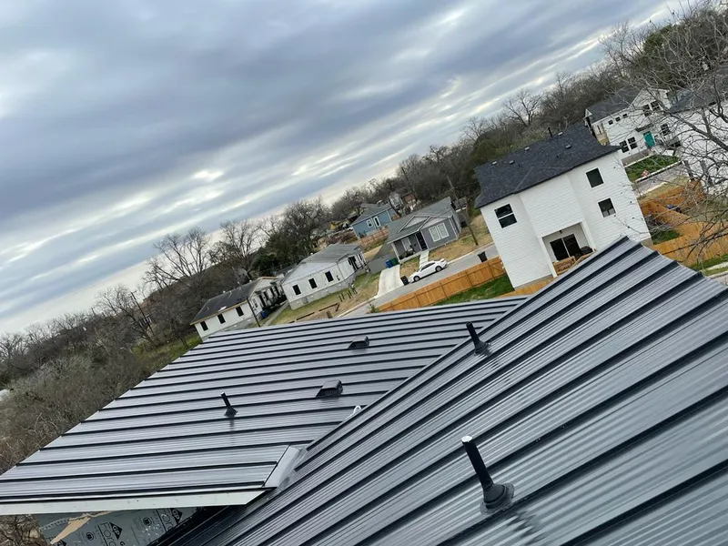 Standing seam metal roof panels with vents for Skylight Repair in Easley